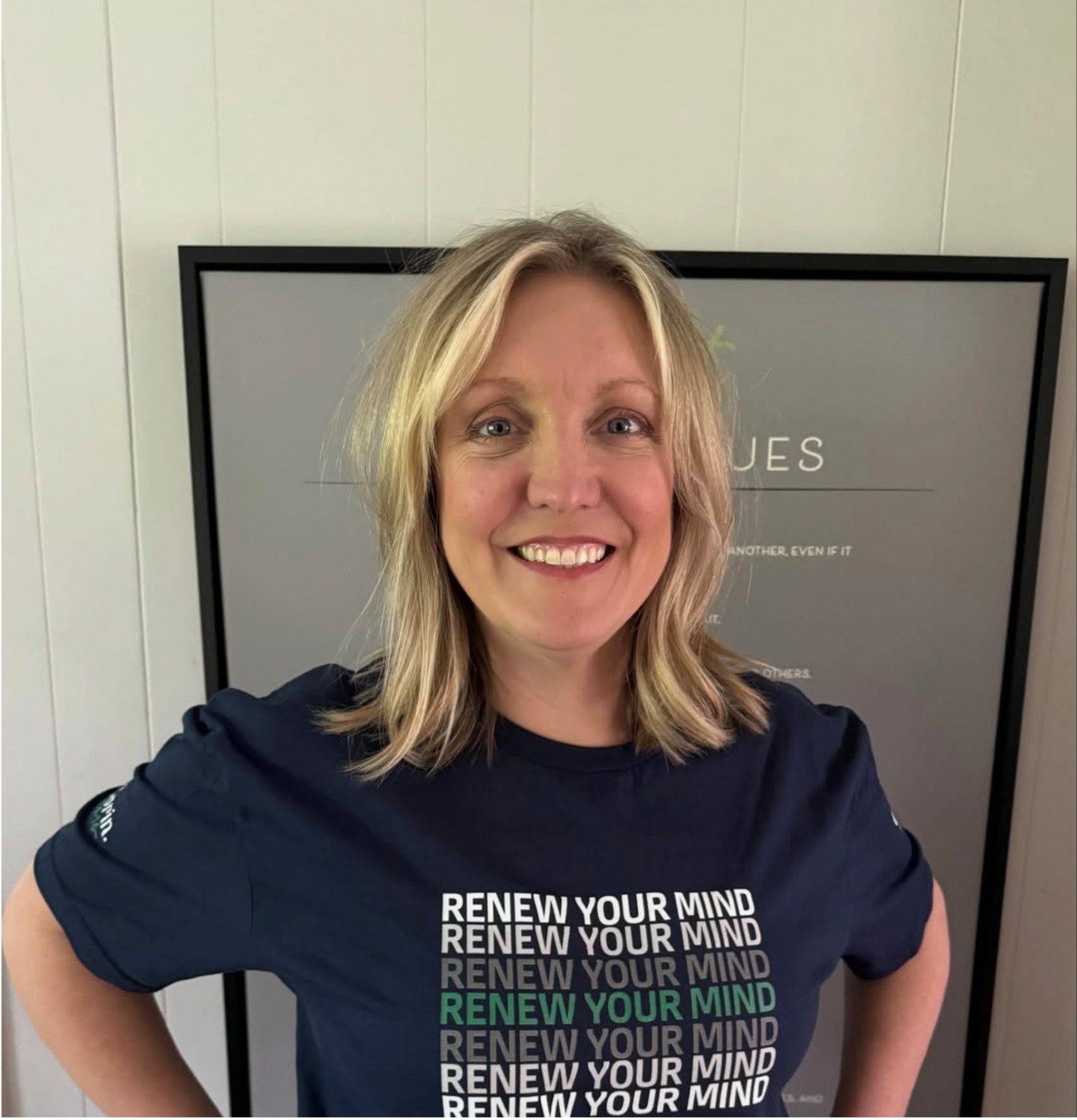 Andrea wearing the RENEW YOUR MIND tee